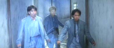 Chan Tat-kwong et deux complices dans Police Story 2